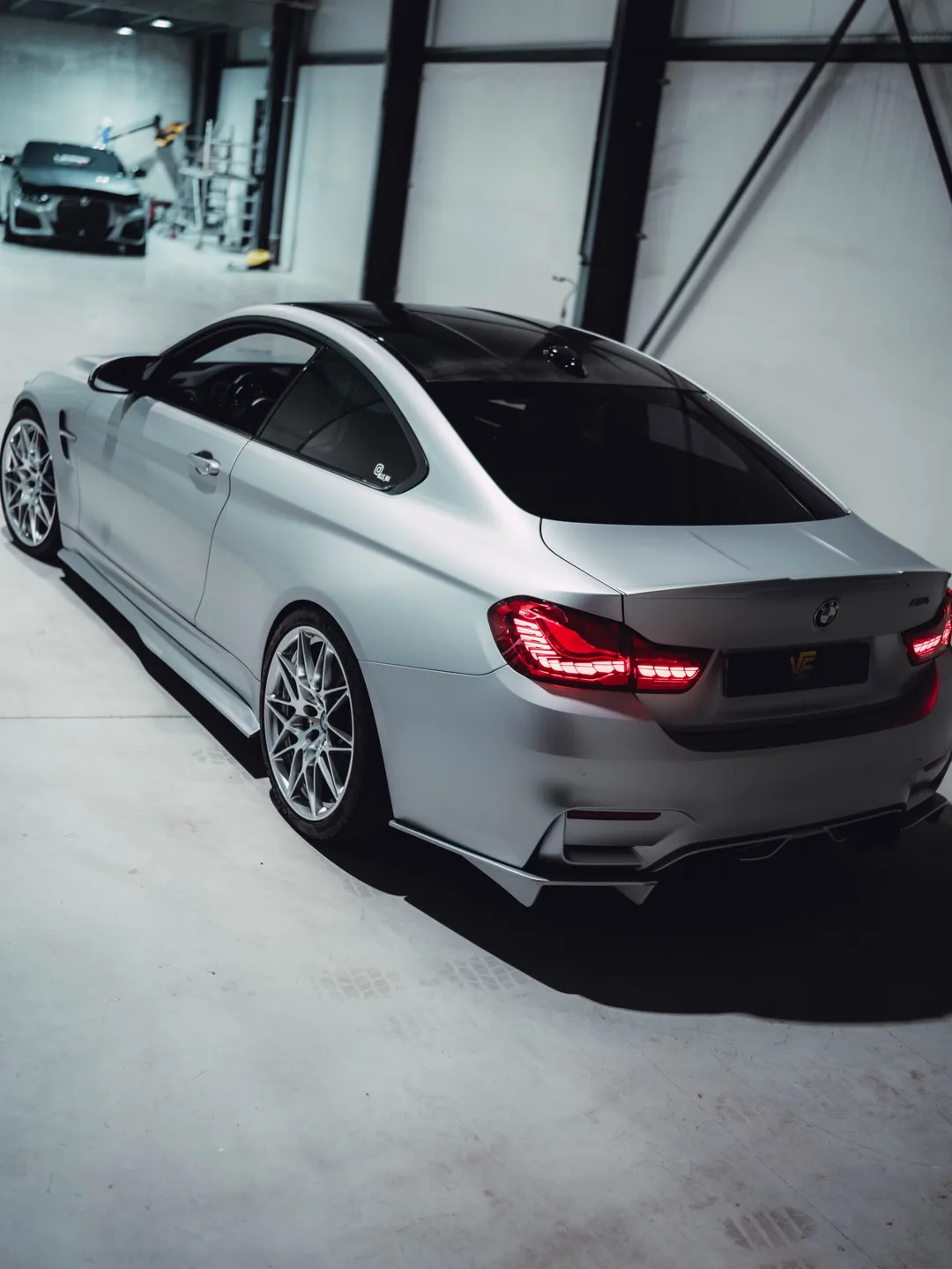 “Swiss spec” BMW M4 in 3M Satin White Aluminium door Verhagen Exclusive