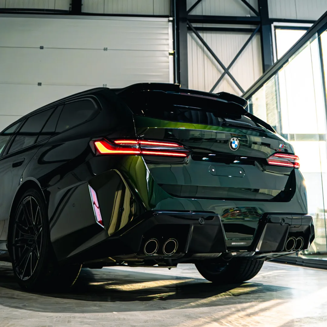 BMW M5 Touring in Individual San Remo Green met Full Front PPF en keramische coating