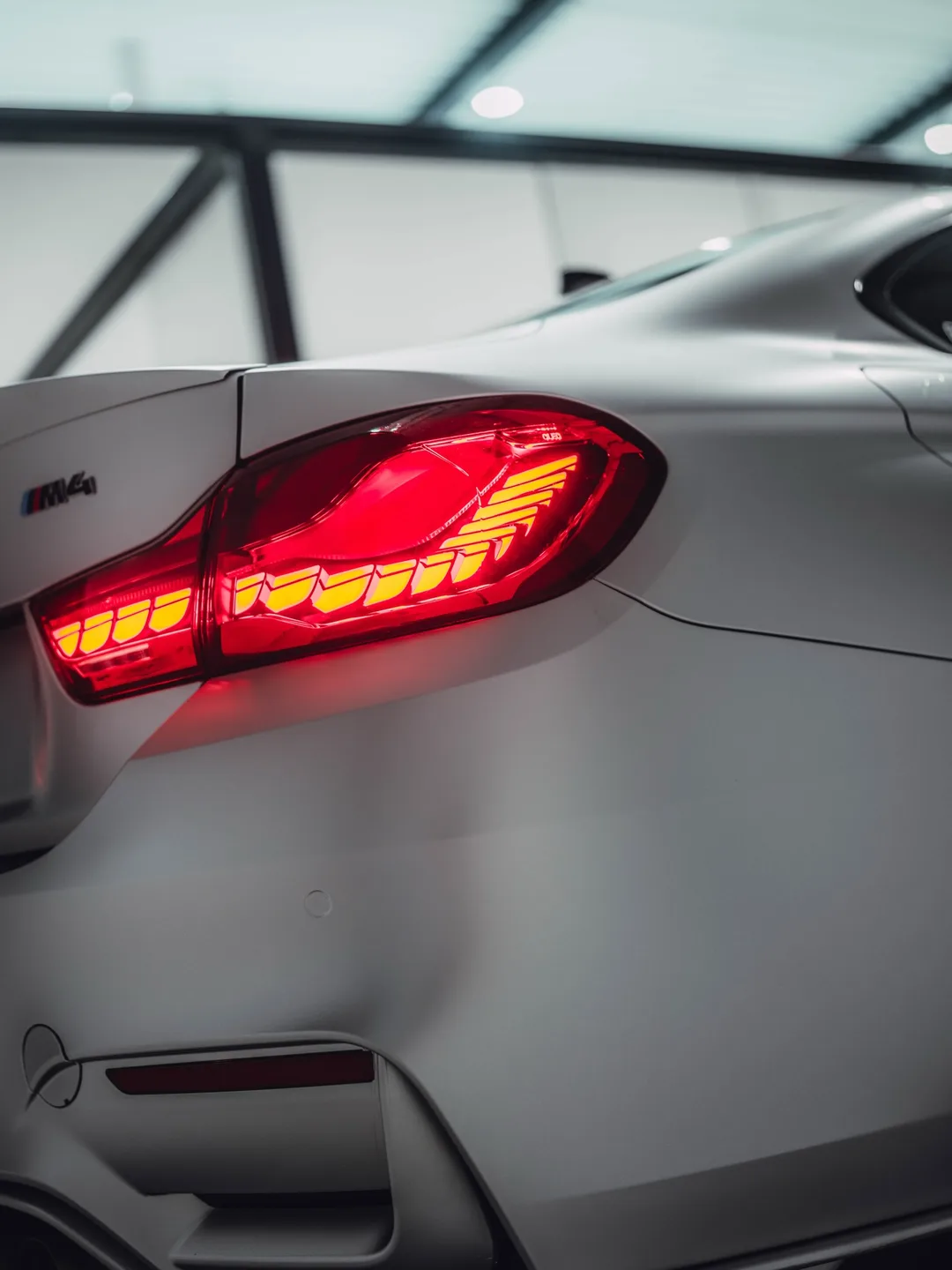 “Swiss spec” BMW M4 in 3M Satin White Aluminium door Verhagen Exclusive