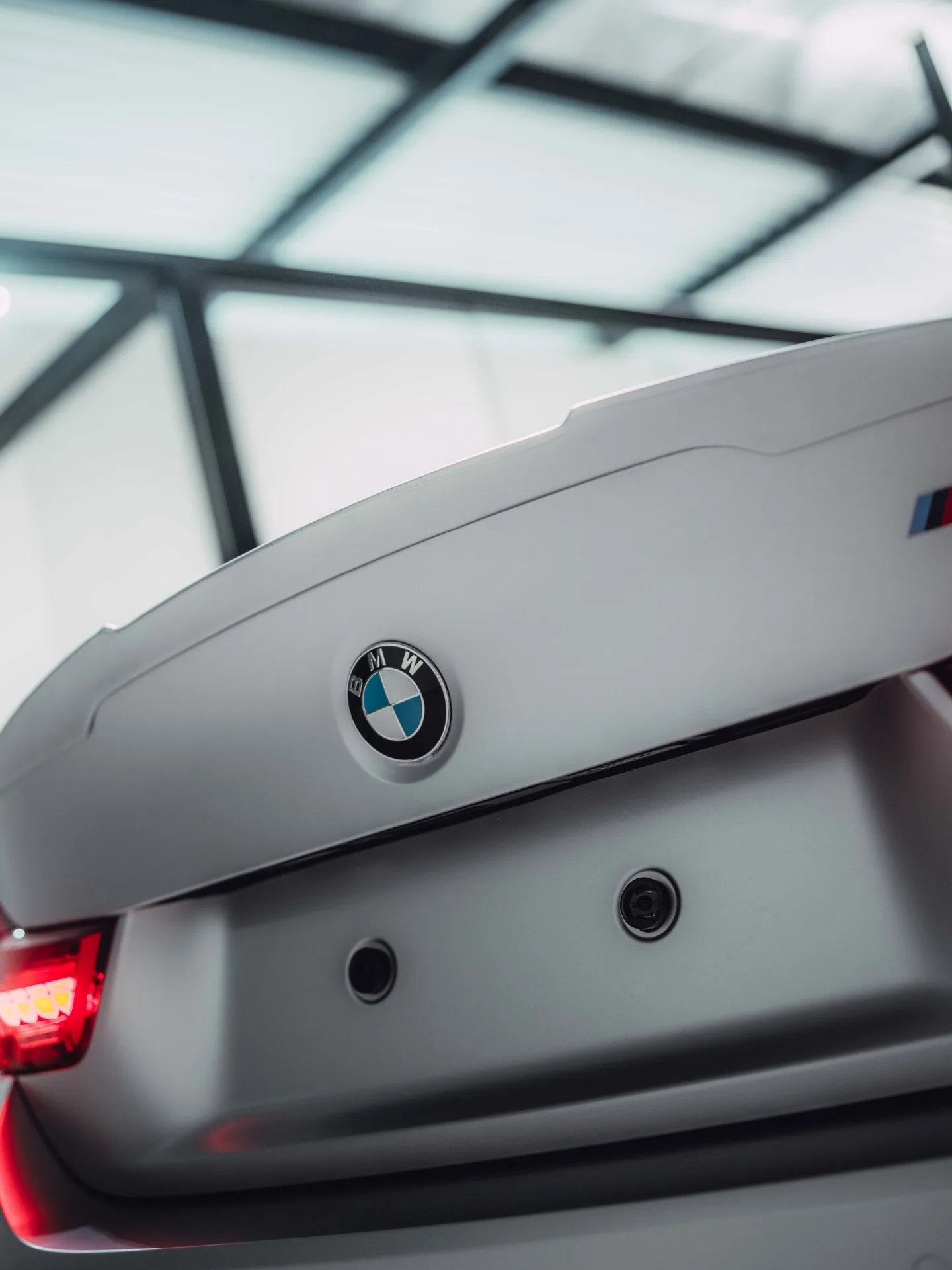 “Swiss spec” BMW M4 in 3M Satin White Aluminium door Verhagen Exclusive